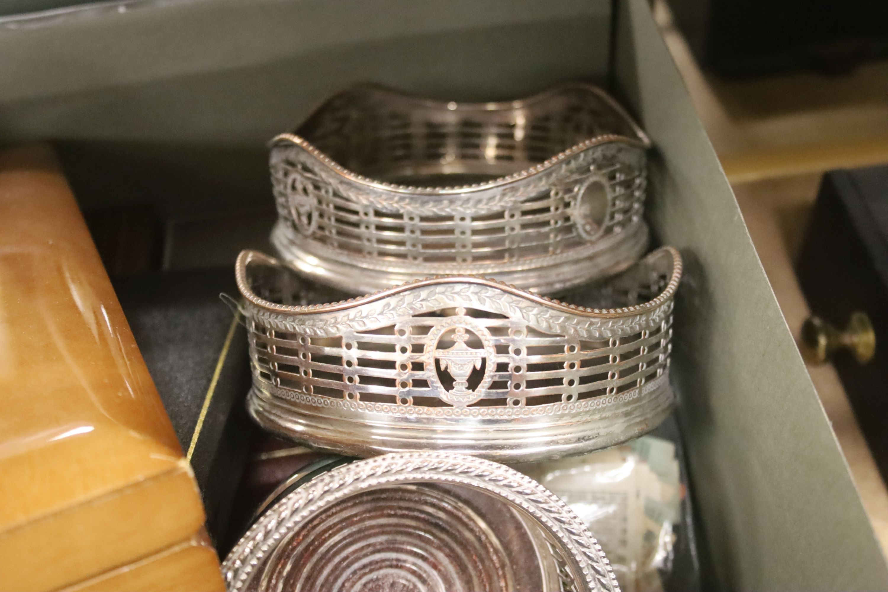 A coffee grinder, coin boxes, a silver plated coaster, etc.